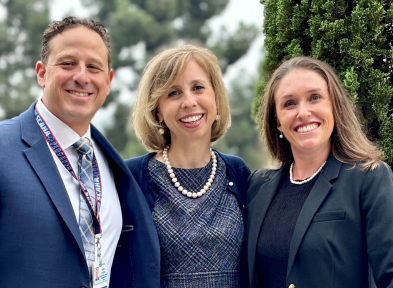 David Hough, Bridget Hough, and Caitlin Hargadon posed for a group photo